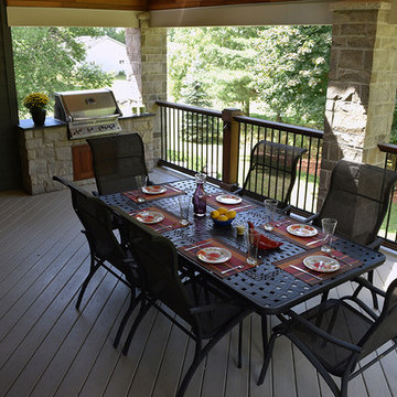 A stone deck built on steel substructure and a covered porch deck in Veka vinyl.