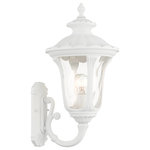 Livex Lighting - Textured White Traditional, Victorian, Sculptural, Outdoor Wall Lantern - From the Oxford outdoor lantern collection, this traditional cast aluminum upward facing single-light medium wall lantern design will add curb appeal to any home. It features a handsome, antique-style wall plate and decorative arm. Clear water glass casts an appealing light and lends to its vintage charm. The wall plate, arm and other details are all in a textured white finish. With superb craftsmanship and affordable price, this fixture is sure to tastefully indulge your senses.
