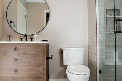 Bathroom - mid-sized transitional kids' ceramic tile and blue floor bathroom idea in Indianapolis with beige walls and a hinged shower door