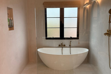 Bathroom - large contemporary master porcelain tile and beige floor bathroom idea in Los Angeles with gray walls