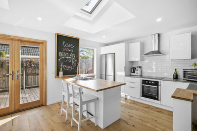 Photo of a small contemporary kitchen in Melbourne.