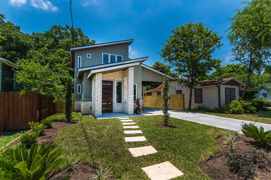 Example of a transitional exterior home design in Austin