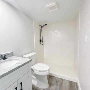 Master Bathroom Shower: Modern Coastal Condo Transformation