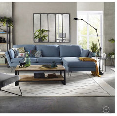 Comment placer un tapis dans un salon avec avec canapé d'angle?