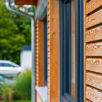 Holzanbau an ein Einfamilienhaus