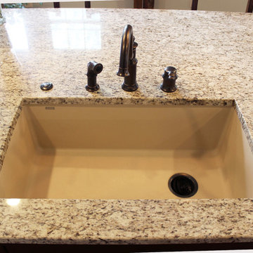 Painted Cream with Brown Glaze Cabinets with Giallo Granite Countertops ~ Sevill