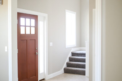 Inspiration for a craftsman entryway remodel in Other