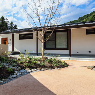 他の地域のアジアンスタイルのおしゃれな前庭 (私道、半日向) の写真