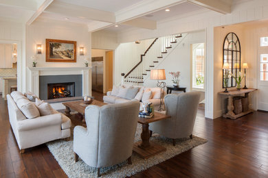 Large traditional formal open concept living room in Other with white walls, dark hardwood floors, a standard fireplace and a stone fireplace surround.