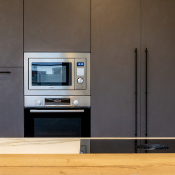 Création dune cuisine ouverte avec coin repas dans un pavillon contemporrain