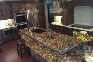 Example of a classic home design design in Denver