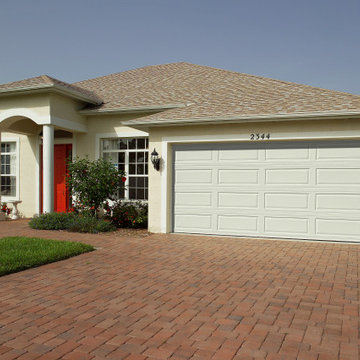 White Plaine Style Garage Door | By Unified Home Remodeling