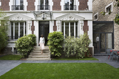 Inspiration pour une façade de maison traditionnelle.