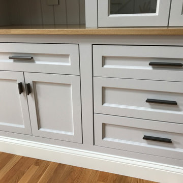 Multifunctional Cabinet System in a Family Room and Mudroom
