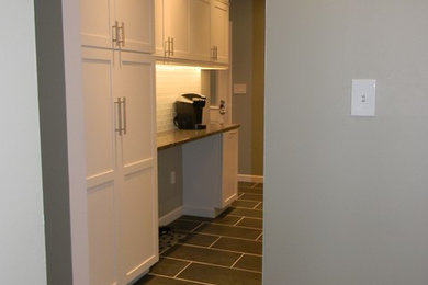 Example of a transitional home design design in Baltimore