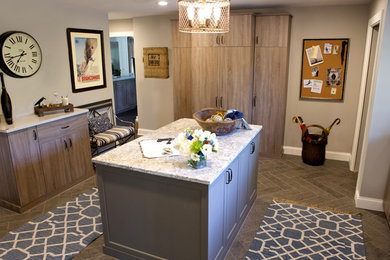 Example of a large transitional porcelain tile entryway design in Minneapolis with gray walls and a white front door