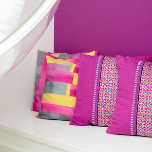 Large contemporary walk-out basement in DC Metro with white walls and a ribbon fireplace.