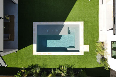 Small minimalist courtyard rectangular pool photo in Austin