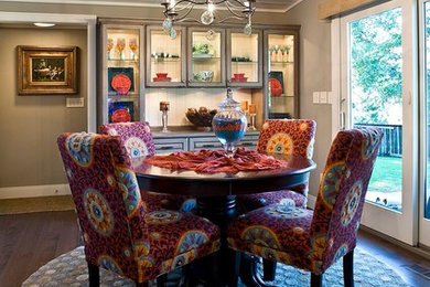 Inspiration for a large transitional dark wood floor dining room remodel in Other with gray walls and no fireplace
