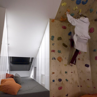 Inspiration for a small eclectic home climbing wall in Austin with white walls.