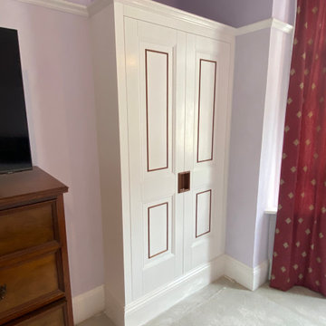 Bespoke Fitted Wardrobes with Painted Panelled Doors and Wood Inlay | Cheltenham