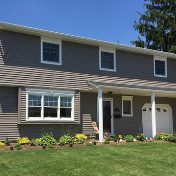 Massapequa Siding - Storm Clapboard with new Windows and Charcoal Roof