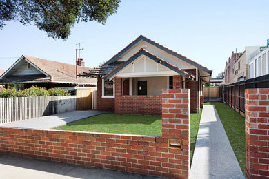 This is an example of a brick red house exterior in Melbourne.