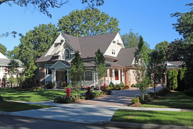 Inspiration for a large rustic red two-story brick exterior home remodel in New York