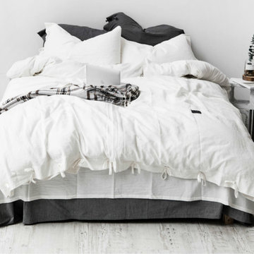 White linen duvet cover with knot ties.