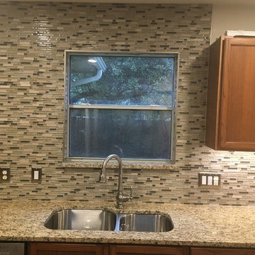Kitchen Backsplash - Linear Mosaic and Glass with Santa Cecilia Granite Counter