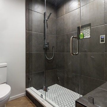Golden Wood & Dark Charcoal Bathroom with Luxurious Steam Shower