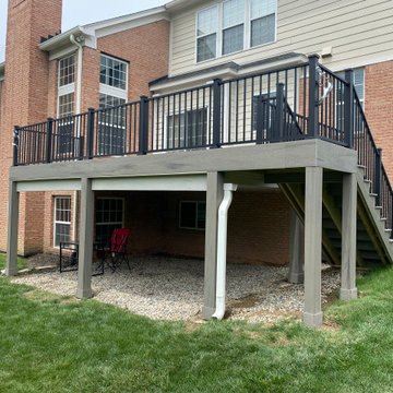 Rain system ceiling beneath a composite deck.