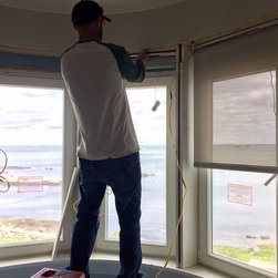 Lutron motorized automated roller shades - Window Treatments