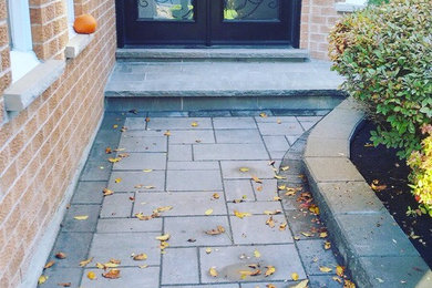 Mid-sized traditional exterior home idea in Toronto