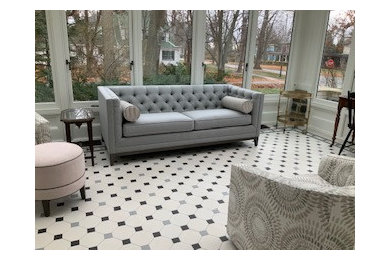 Example of a large ornate porcelain tile and white floor sunroom design in Other