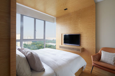 Photo of a contemporary bedroom in Singapore.