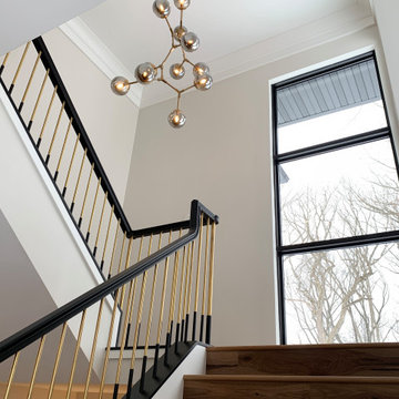 New Home in Bettendorf Quad Cities with Modern Lighting and Custom Cabinetry