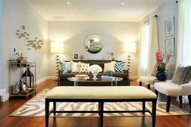 Mid-sized eclectic formal and open concept living room photo in Miami with gray walls