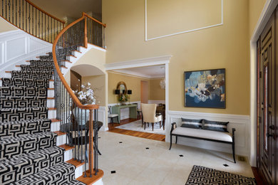 Example of a mid-sized trendy wooden curved metal railing staircase design in New York with wooden risers