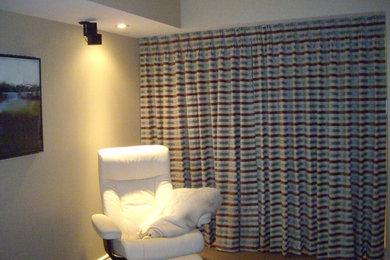 Example of a classic family room design in Toronto
