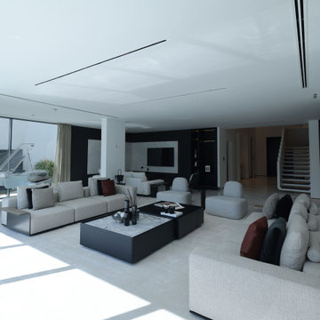Waterfront Living Room with Transparent Grand Piano