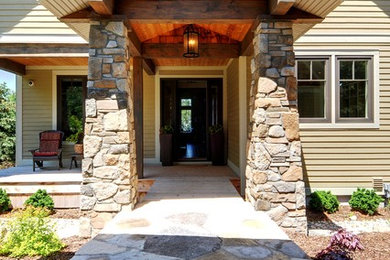 Example of a transitional exterior home design in Toronto