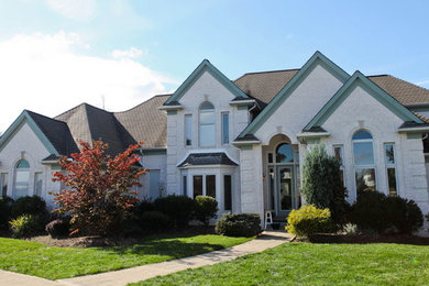 Inspiration for a transitional exterior home remodel in Other