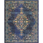 Nourison - Nourison Passionate Area Rug, Navy, 8'9"x11'9" - With a deep navy blue field, the dramatic corner and medallion design of this Passionate Collection rug creates a regal presence in any room. Distressed, abrash tones mirror the vintage look of classic Persian rugs, with beautifully ornate floral accents on an soft, easy-care pile.