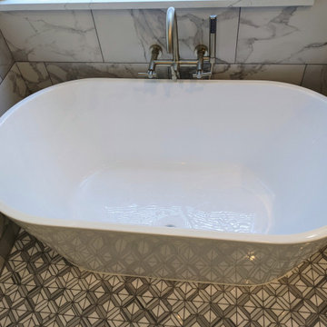 Marble and espresso bathroom