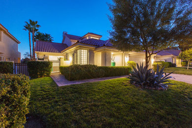 Inspiration for a contemporary two-story exterior home remodel in Las Vegas