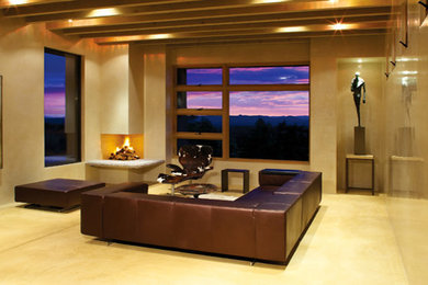 This is an example of a mid-sized modern formal open concept living room in Albuquerque with beige walls and ceramic floors.