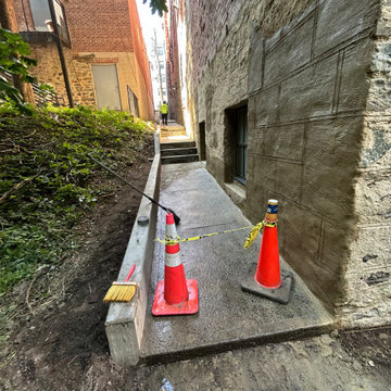 Curb/Exterior Wall Stucco/ParaPro Flashing/Garage slab replacement/Drainage