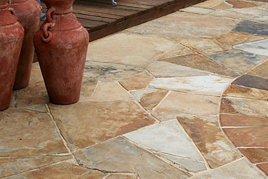 Patio fountain - stone patio fountain idea in Dallas with no cover