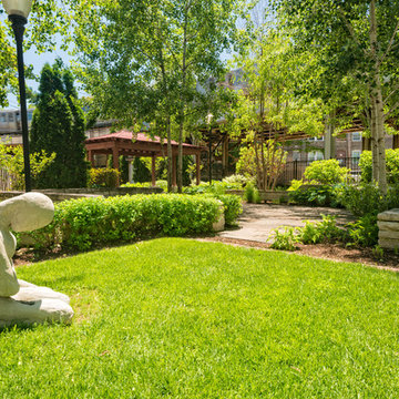 Small Chicago Park Tucked Between Two 'L' trains